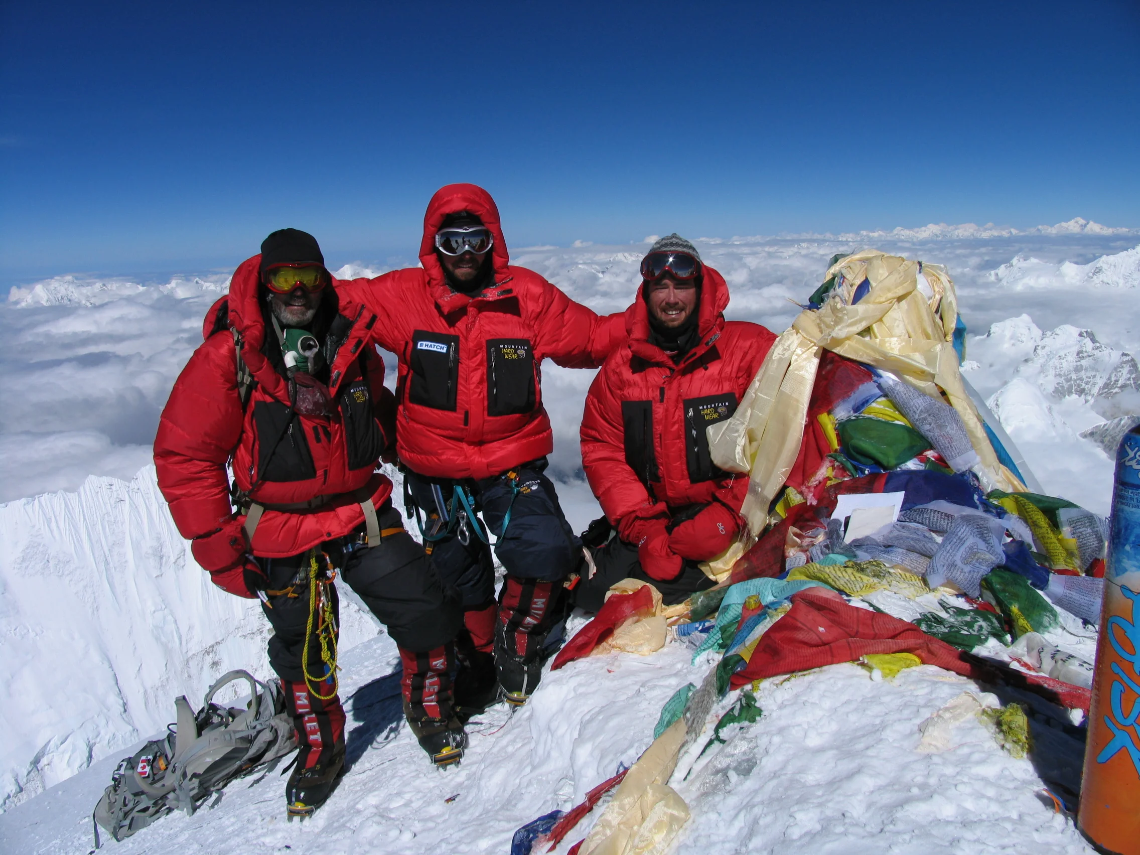 Dan, Alan and Adam Mallory. at the summit of Mount Everest